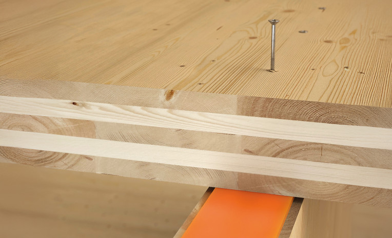 Timber joint with resilient profile for acoustic and structural performance in mass timber construction