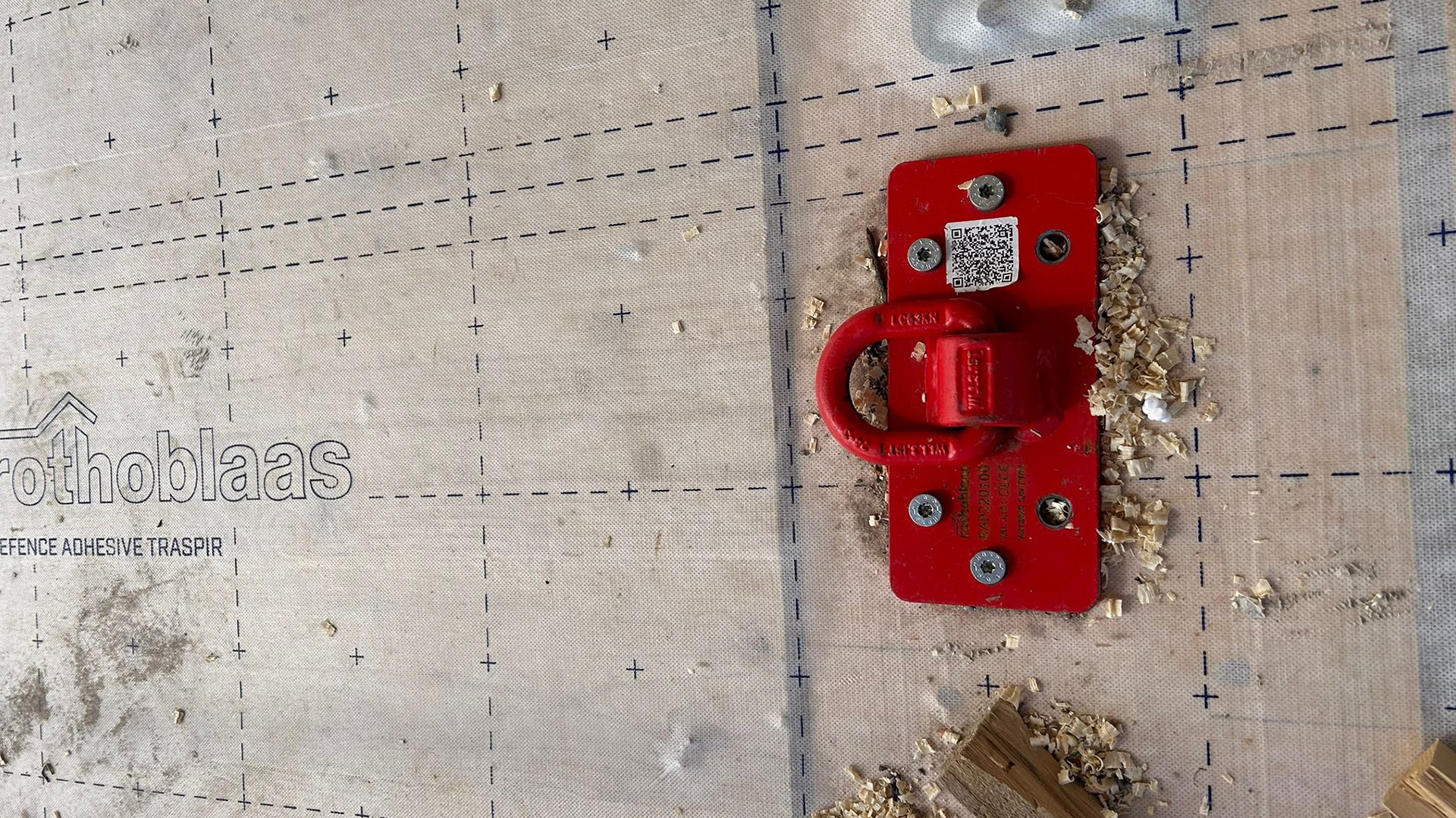 RAPTOR lifting plate installed on timber floor with DEFENCE ADHESIVE TRASPIR membrane during construction